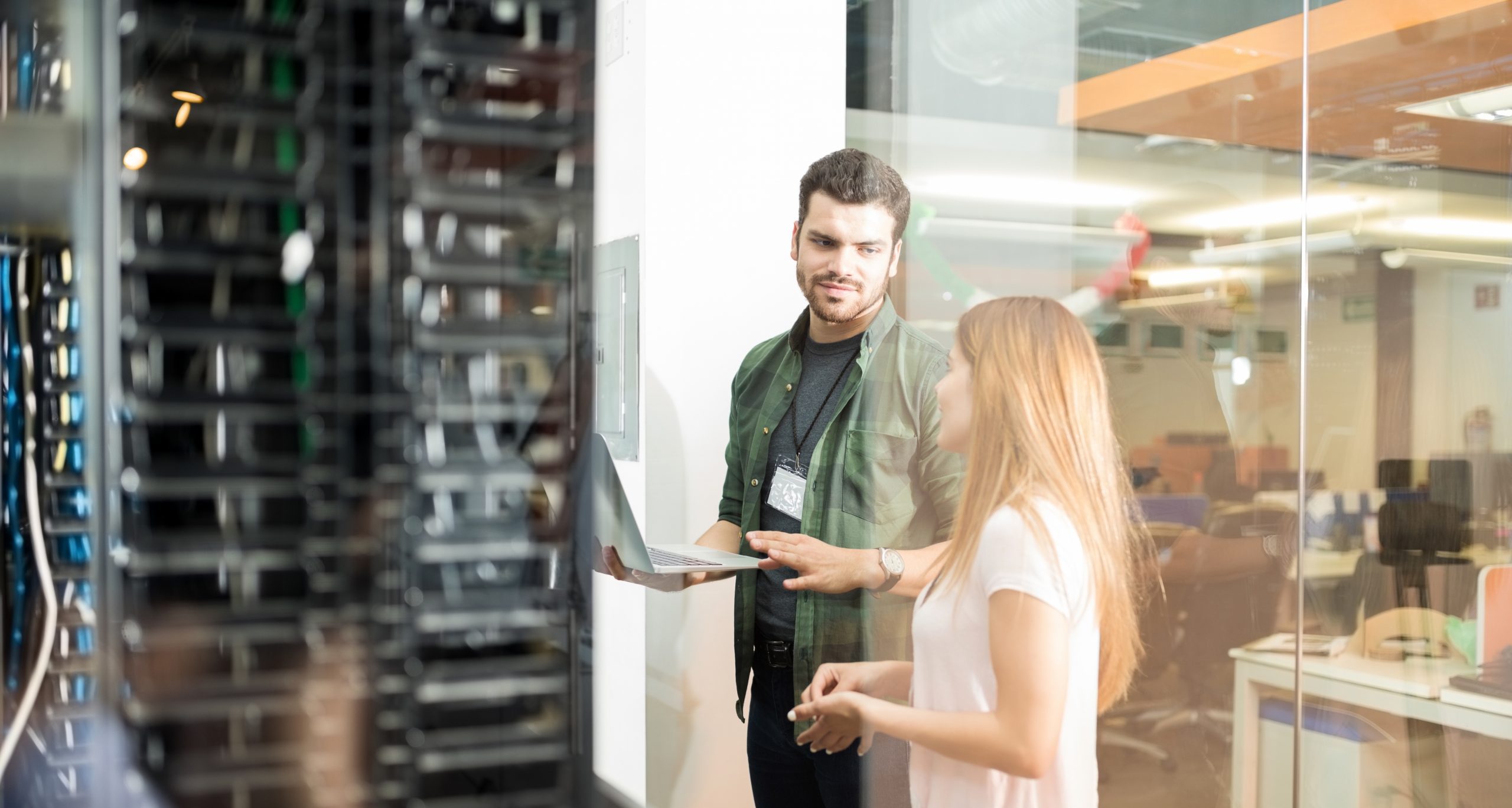 Axians carrier and service providers Colleagues discussing in office server room