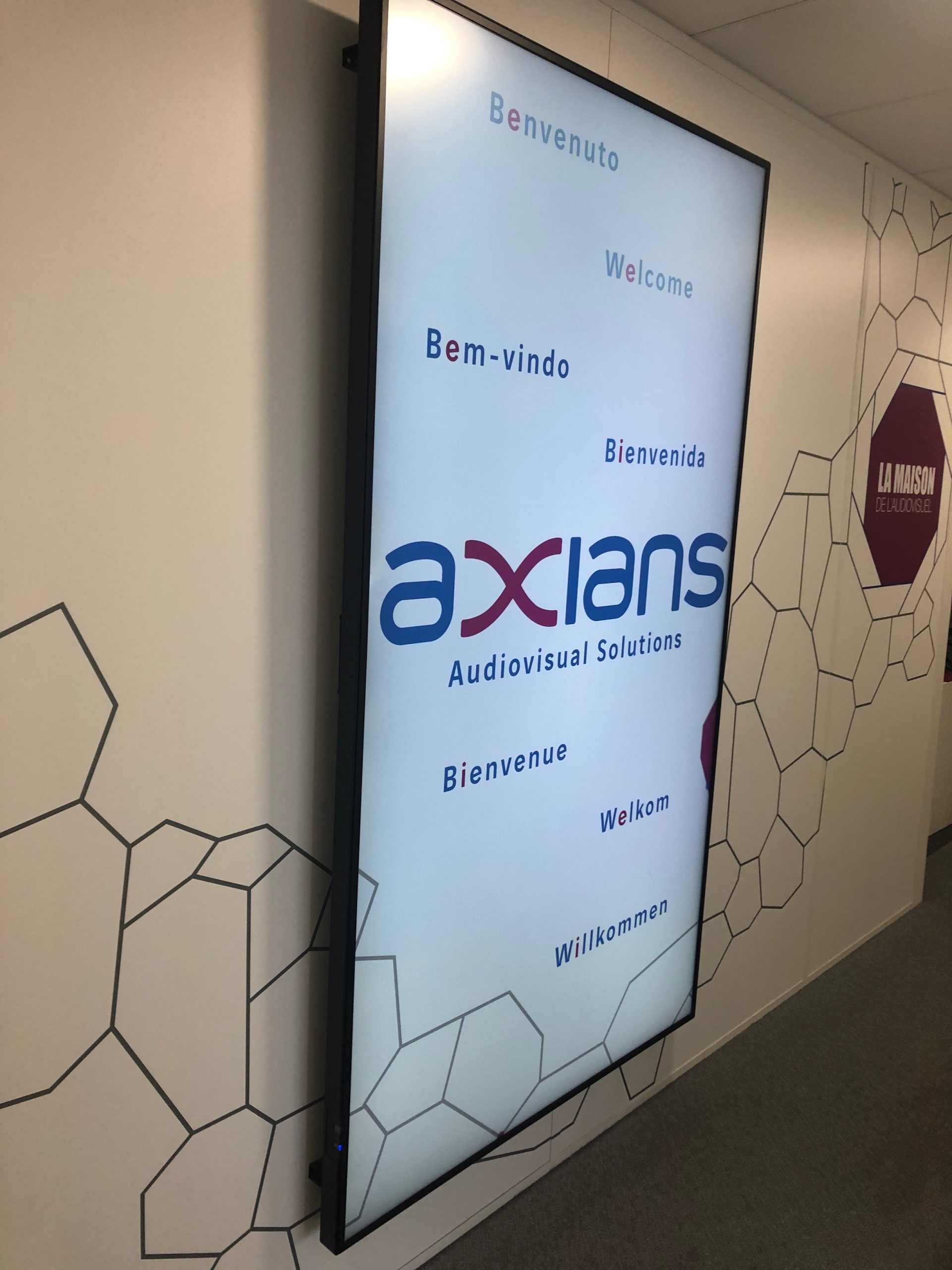 Axians Audio visual screen on wall