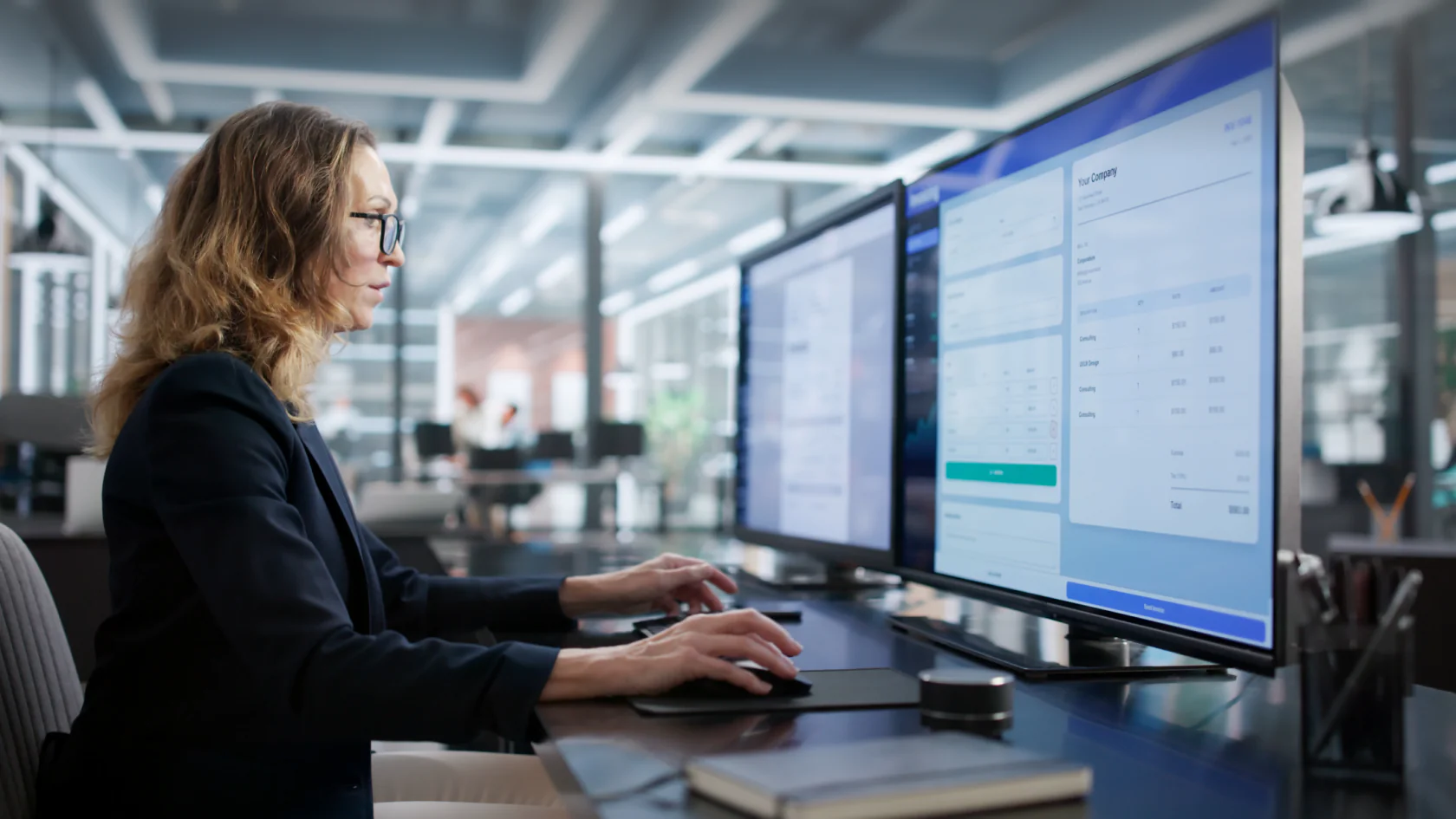 Professional analyzing multiple data dashboards on large monitors using AI-powered document intelligence.